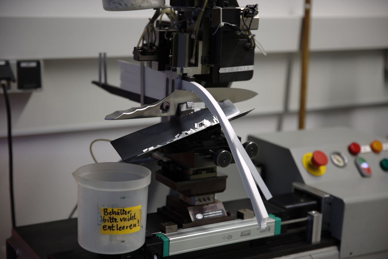 About Close-up of knife testing machine in Solingen, showcasing precision engineering.